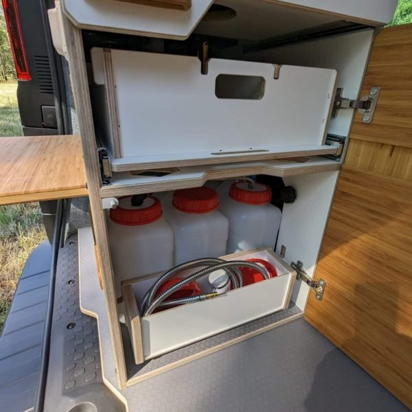 Three 12L water cans, one for waste water and two for